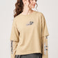 Via Artists beige long-sleeve layered cotton t-shirt featuring embroidered rolling pandas and desk-themed graphics.