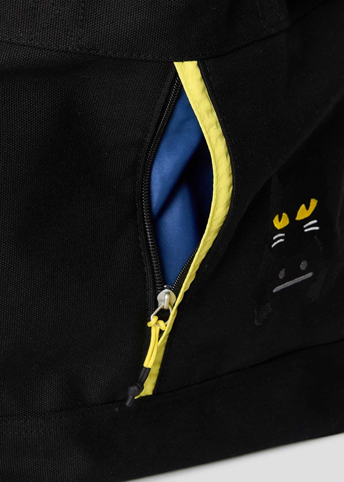 Via Artists Nekokaburi black cotton canvas 2-way tote bag featuring an embroidered cat mask design and yellow zipper.