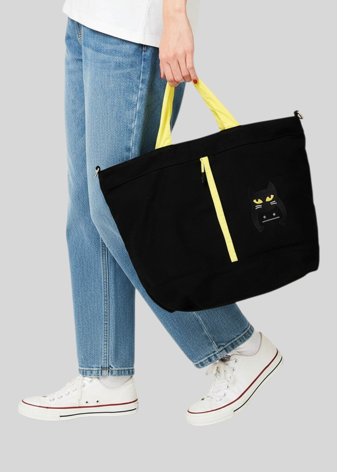 Via Artists Nekokaburi black cotton canvas 2-way tote bag with yellow straps and embroidered cat mask design.