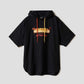 Via Artists black short-sleeve hoodie featuring an embroidered long dog hot dog graphic and colorful drawstring cords.