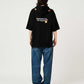 Via Artists black short-sleeve hoodie with Nagasugiru Inu Hot Dog graphic on back and red panda embroidery on hood