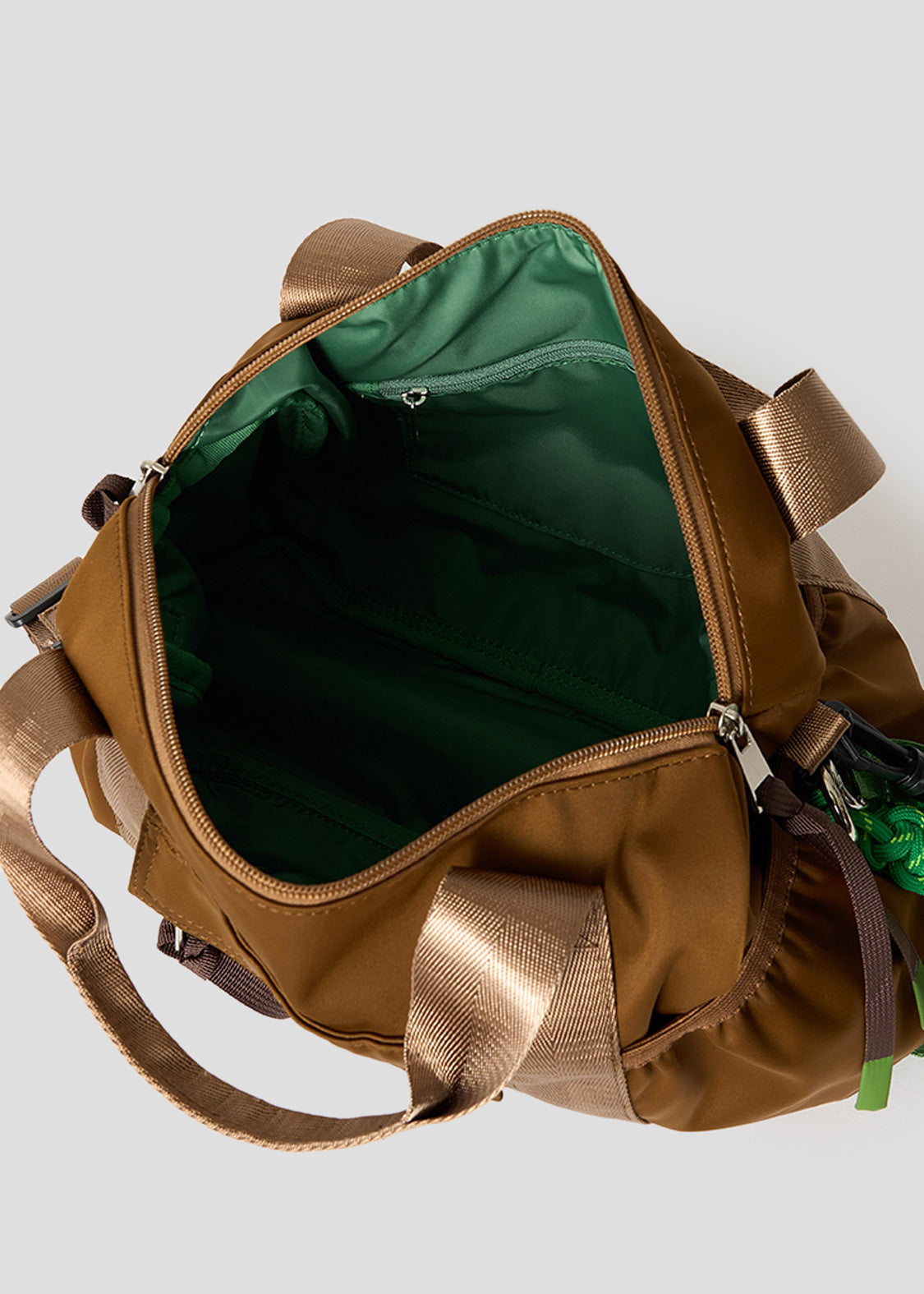 Via Artists Ikaku Lucha Boston shoulder bag interior view showing green lining and zippered pocket