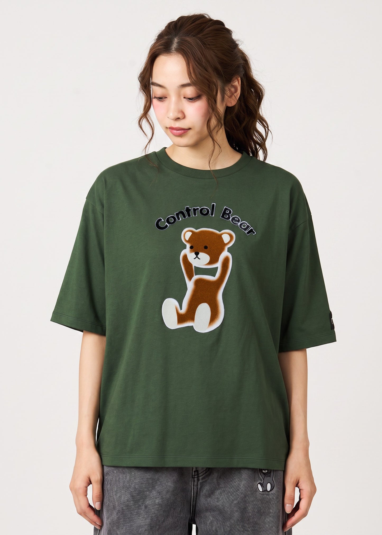 Via Artists Control Bear peach-brushed dark green unisex 5/8 sleeve t-shirt with a flock print bear graphic