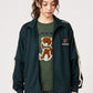 Via Artists dark green unisex track jacket with detachable sleeves, velour tape accents, and Control Bear embroidery.
