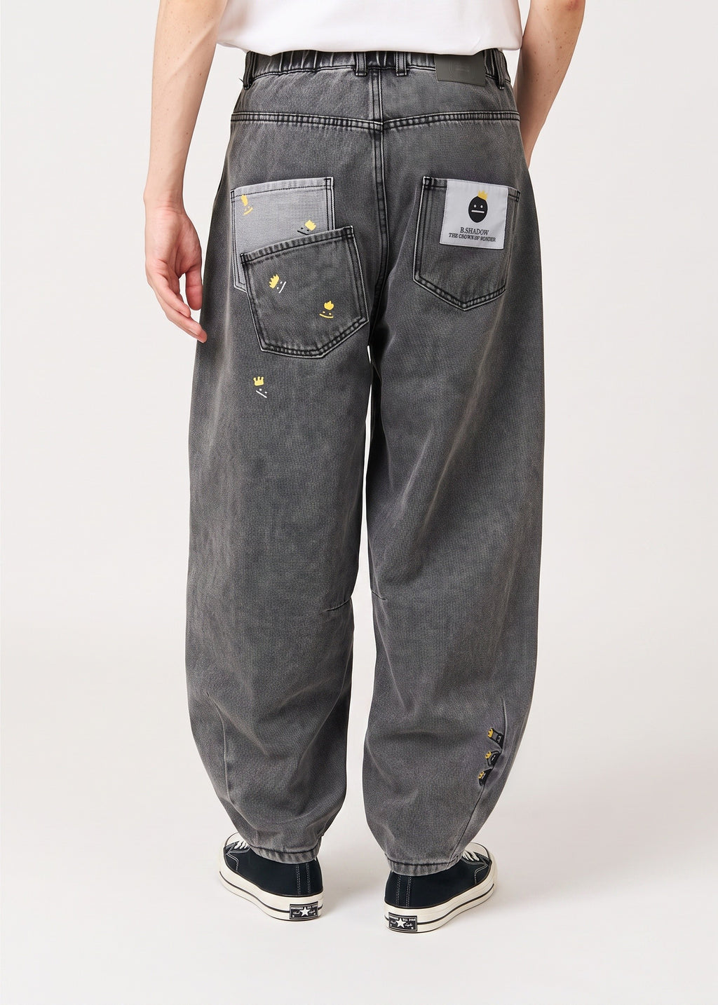 Via Artists unisex balloon denim pants in washed grey with crown embroidery and elastic back waistband, back view