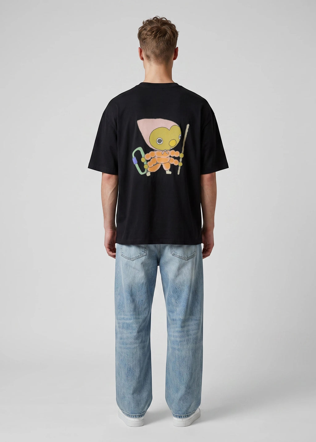 Via Artists Helcovell Guard oversized black cotton t-shirt with a colorful character graphic on the back