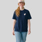 Via Artists Helcovell Sleepy beige cotton 6-panel baseball cap with pink heart embroidery worn by a smiling woman
