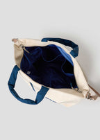 Via Artists Ikaku Goron 2-way tote bag in cream cotton canvas with blue interior lining and multiple storage pockets
