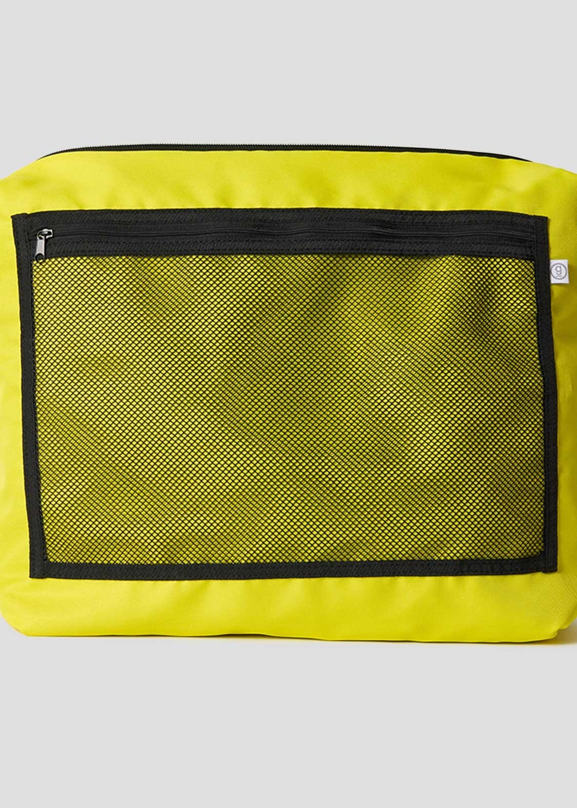 Via Artists Kitaro shoulder bag in bright yellow nylon with a large black mesh front pocket and zipper closure.