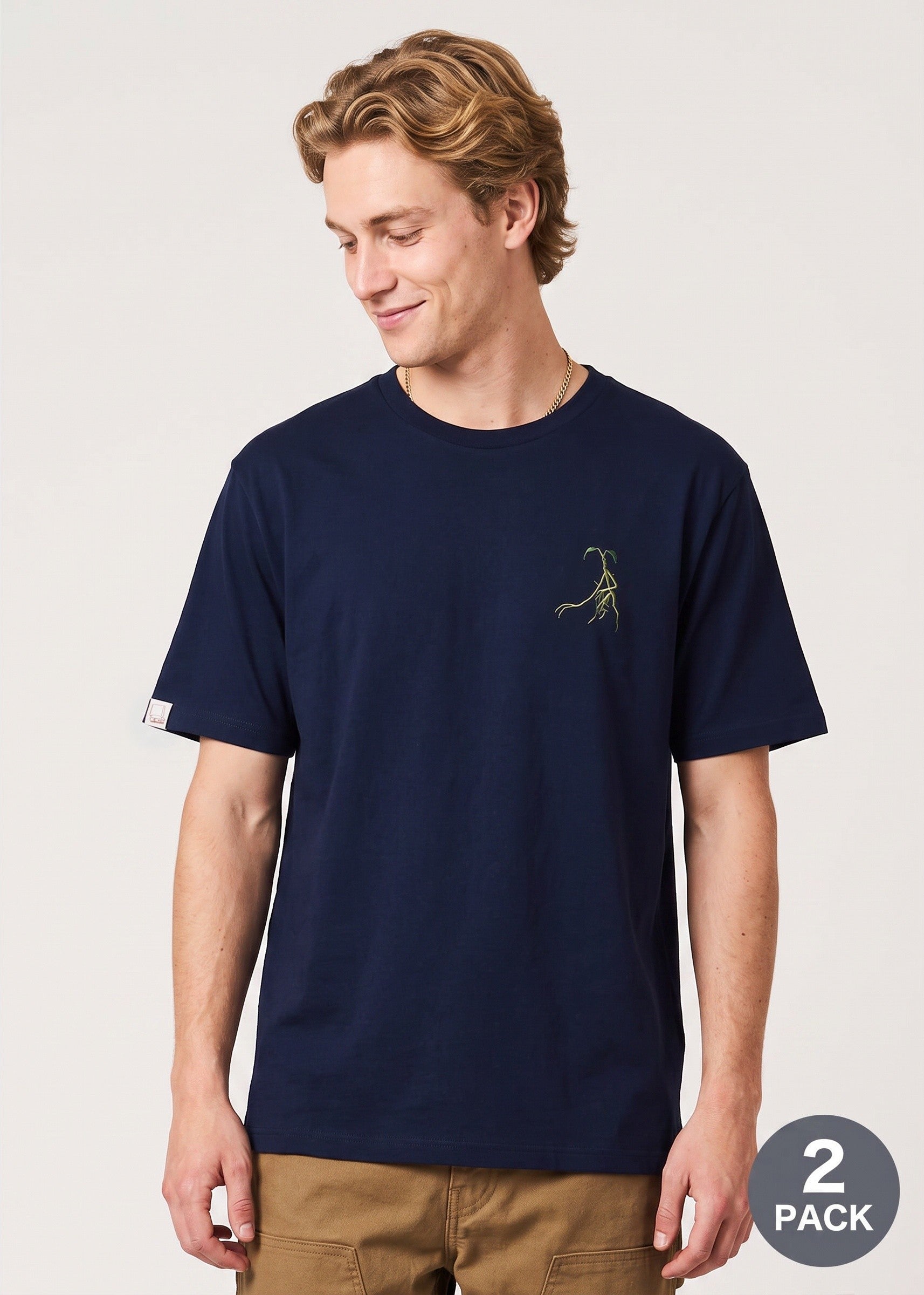 Via Artists navy cotton t-shirt with Pickett the Bowtruckle embroidery and Newt's trunk label on the sleeve