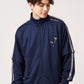 Via Artists Rolling Pandas navy blue jersey track jacket with detachable sleeves and velour tape detailing.