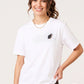 Via Artists white cotton t-shirt featuring embroidered Niffler character from Harry Potter on the chest