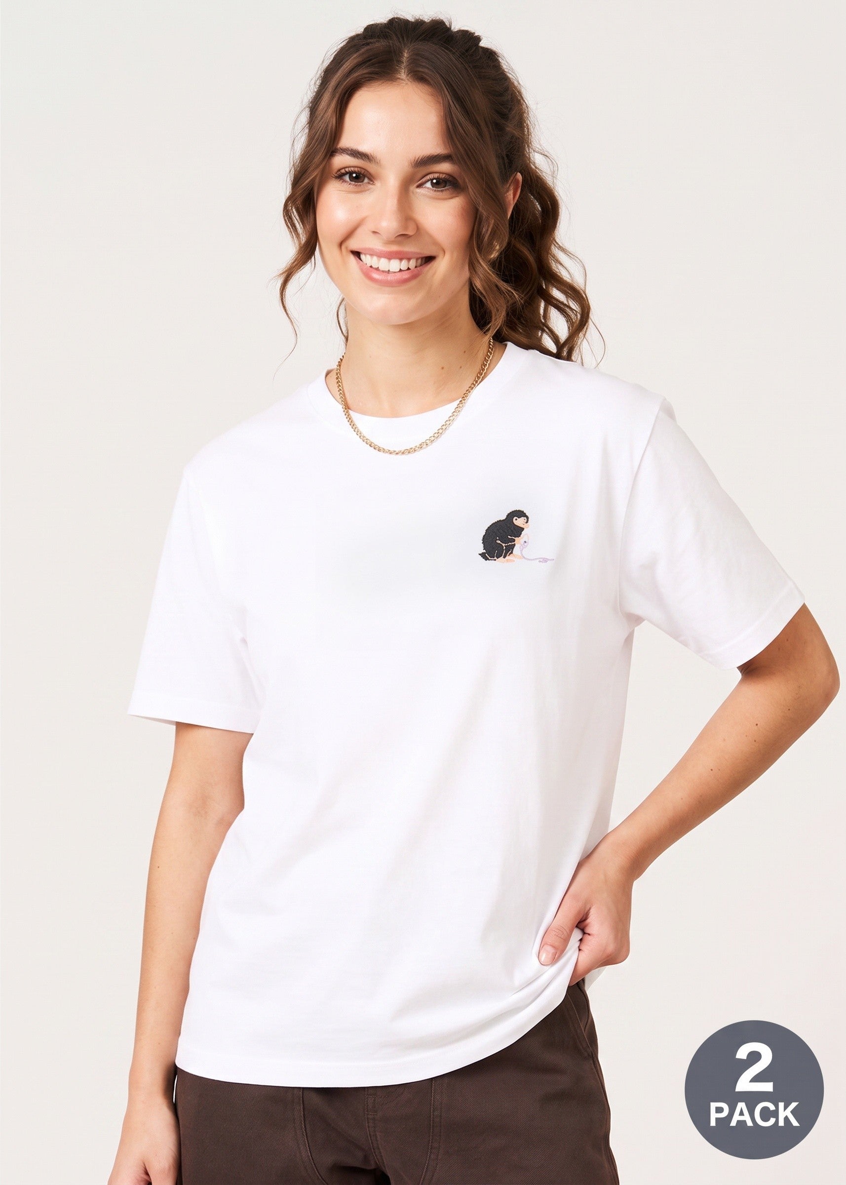 Via Artists white cotton t-shirt featuring embroidered Niffler character from Harry Potter on the chest